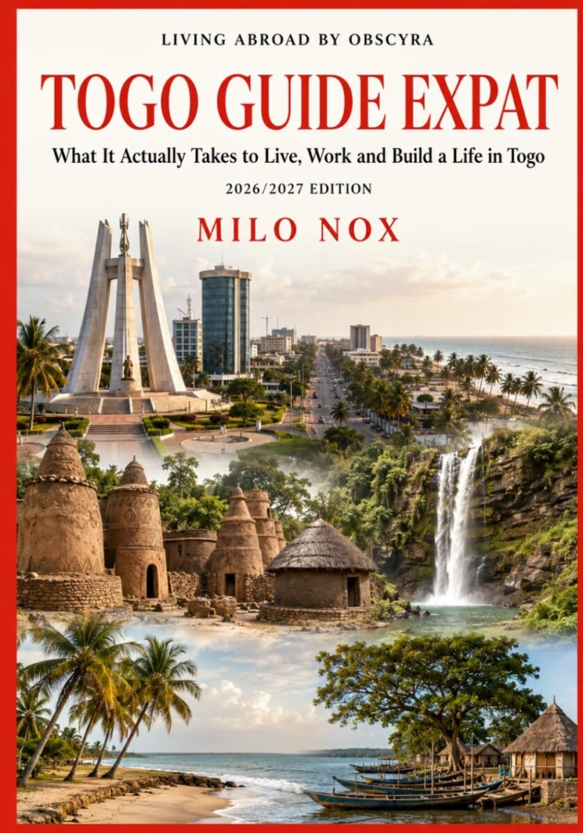 Minimalist white book cover for “TOGO GUIDE EXPAT” by Milo Nox. The collection name “LIVING ABROAD BY OBSCYRA” appears at the top in spaced black lettering. The title is displayed in large black serif capitals, followed by the italic subtitle “What It Actually Takes to Live, Work and Build a Life in Togo”. Below is “2026/2027 EDITION”, with the author’s name “MILO NOX” near the bottom. No photograph or illustration.
